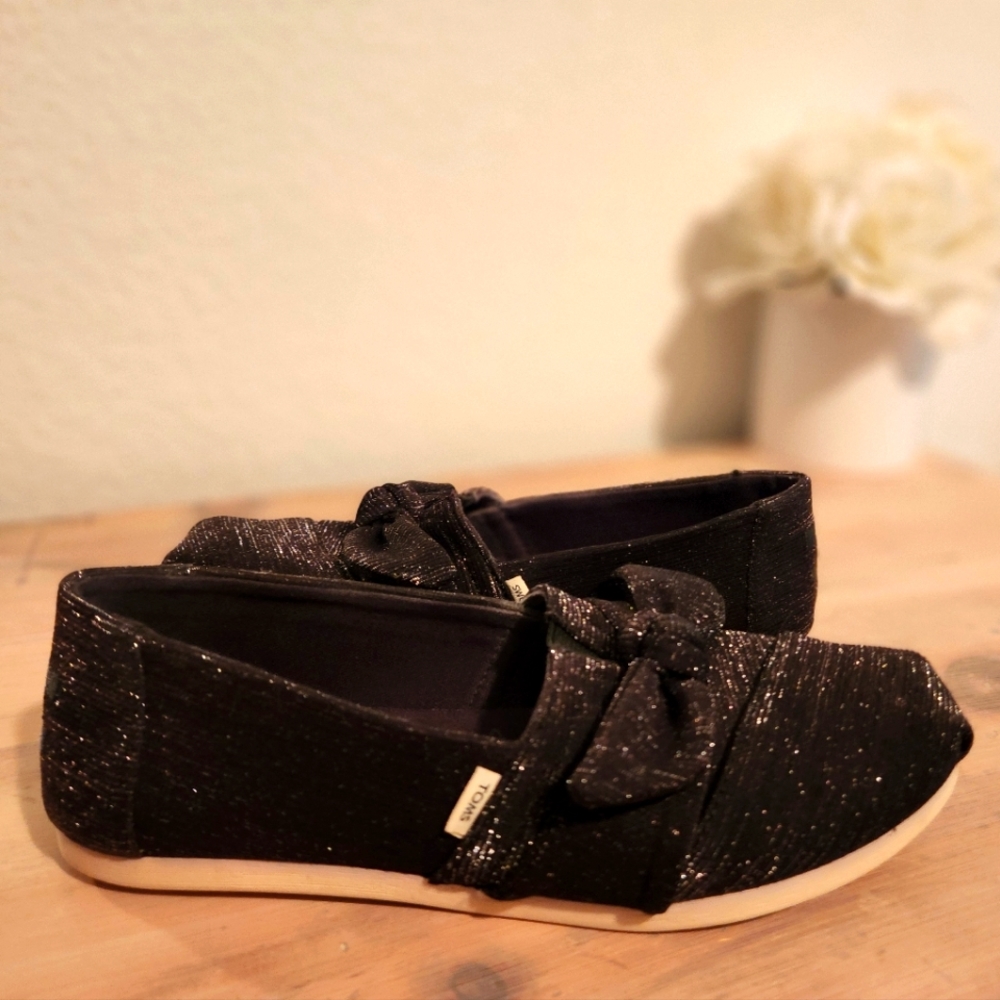 Tom's sparkly bow flats